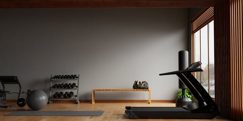 Dark modern gym interior with sport and fitness equipment